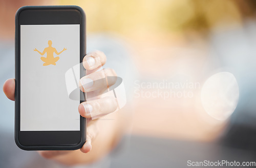 Image of Hand with phone on yoga online app and screen with mockup outdoor. Exercise, meditation and workout application or software available for download on 5g mobile smartphone for health and wellness