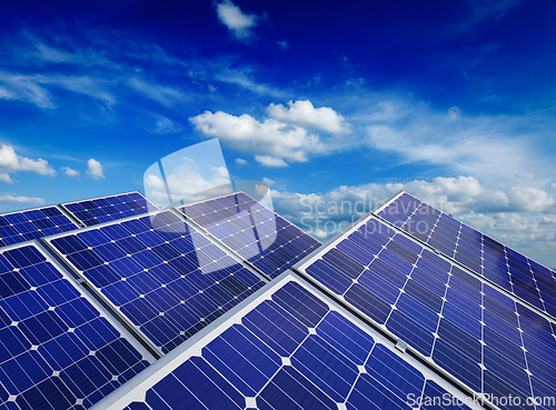 Image of Solar battery panels against blue sky