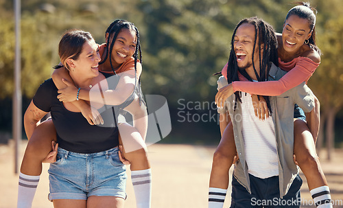 Image of Friends, running and happy park group doing a piggy back race in nature. Diversity of laughing friendship of women and a man from Jamaica having a fun comic time and experience in the sun in summer