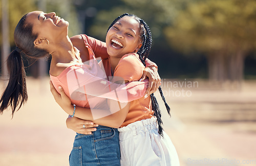 Image of Happy friends or women hug and laugh together in nature at a park or forest. Smiling, playful sisters embracing, bonding, enjoying a day outdoor and showing affection and appreciation in the woods