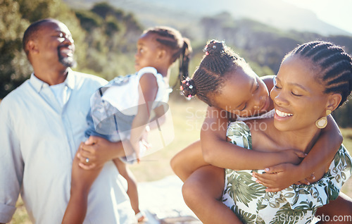 Image of Happy, picnic and care with black family at park for fun, summer and relax together enjoying their holiday vacation. Happiness, youth and bond with mother, father and children in outdoors