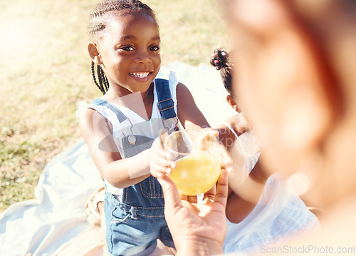 Image of Happy girl, juice and smile in family picnic fun and joy in happiness on a warm summer day in nature. Black child smiling for fresh cold healthy beverage in the hot outdoors with parent and sibling