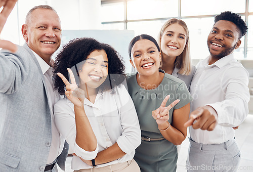 Image of Team building, selfie and happy business people at work enjoy bonding and taking a picture together to post it. Diversity, smile and excited friends having fun in the office after a marketing meeting