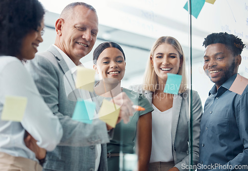 Image of Teamwork, sticky notes or business team on a strategy, moodboard or storyboard in office. Corporate people, staff or workers working together on pinboard in collaboration, communication and planning