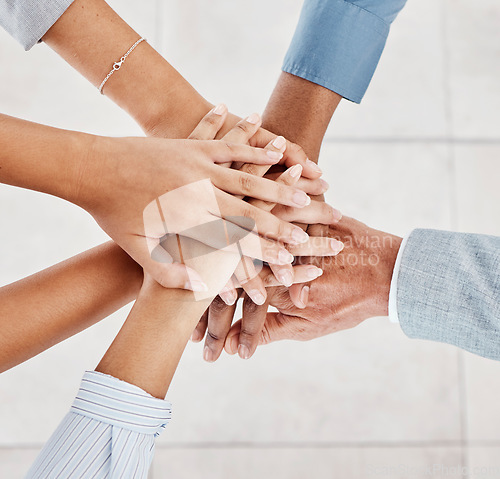 Image of Teamwork hands, collaboration and motivation of business people, trust and growth mission with vision, partnership and support. Above group celebrate commitment, winning goals and corporate diversity