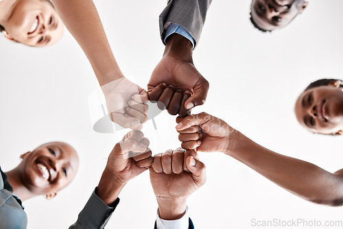 Image of Diversity, hand, or fist group of business people trust, unite and support at work. Below view of happy corporate professional team hands touching showing success and collaboration in startup office