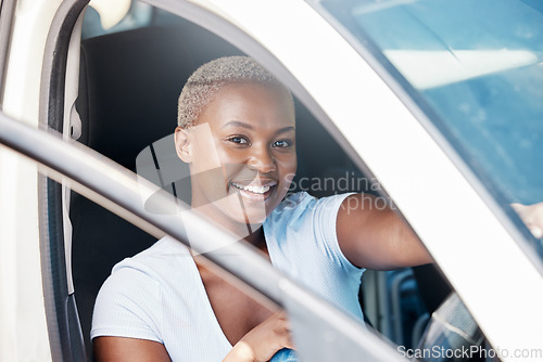 Image of Drive, car and road trip with a young woman sitting in her vehicle and driving with a smile during summer. Portrait of a happy and beautiful female in the front seat of her transport for a ride