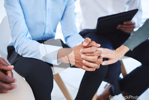 Image of Stress, anxiety and hands with a man in a counselling meeting for trust, support and mental health. Accountability, communication and healthcare with a group sitting and talking about grief or trauma