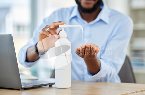 Image of Covid, hand sanitizer or black businessman with laptop cleaning bacteria, virus or stop to global healthcare crisis. Zoom on hands, security or safety in company office by research employee or worker