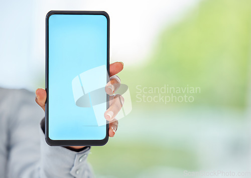 Image of Mockup phone, blank space and blue mobile screen in a hand of a business woman for advertising or marketing. 5g network and wireless technology for a brand logo, internet app or contact us website