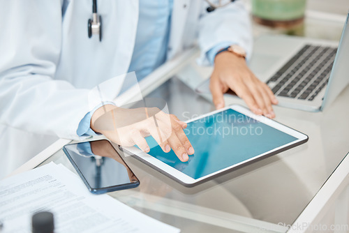 Image of Office, mockup and hands of doctor with tablet browse, search and reading hospital medical information copy space. Healthcare professional woman doing medicine research work for telehealth consulting