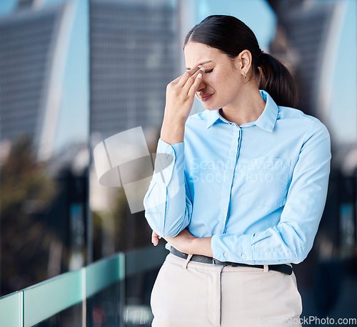 Image of Crying, work burnout and stress headache of a business woman worried about mental health. Corporate lawyer worker on a balcony tired of working and feeling depression and sad anxiety at her job