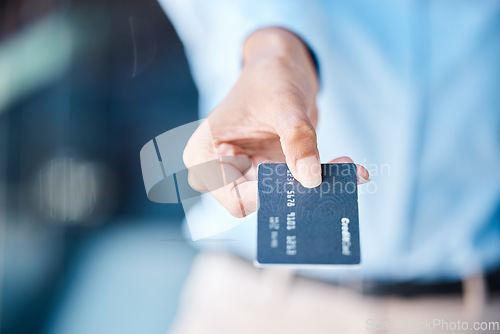 Image of Credit card, shopping and macro hands of customer doing payment with a blur background. Money charge and transaction for commerce purchase with banking account in exchange for a product.