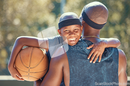 Image of Portrait of happy boy with father and basketball outdoor after training, workout or practice. Black father carrying his boy after playing sport at a club or court during summer with a cute smile