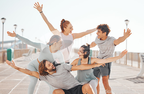 Image of Friends, happy and excited hands outdoors while on exercise break together in gym clothes. Young social circle have goofy, silly and cheerful fun to celebrate their youth on the weekend.