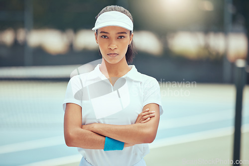 Image of Tennis, game and motivation focus woman on a sport court in a exercise and fitness game. Portrait of a training sports athlete person from Spain determined for workout success and competitive win