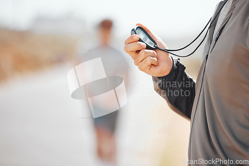 Image of Fitness, coach and stopwatch of hands, time and runner speed and performance for record over blurred background. Hand of trainer in motivation for breaking times holding digital chronometer in sports