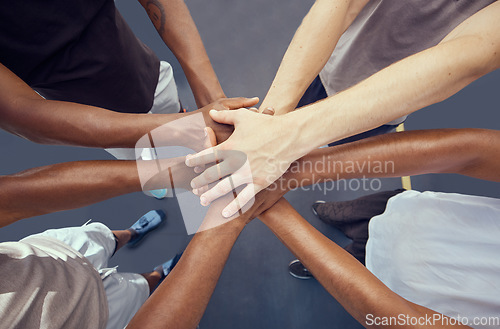 Image of Teamwork, solidarity and diversity sports people hands stacked together from above. Athlete group or community accountability with goal, motivation or team collaboration, trust and fitness mission