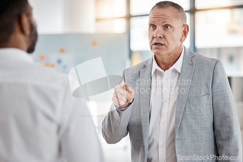 Image of Angry businessman, finger pointing or argument or fight at workplace after misunderstanding. Leader, ceo or boss unhappy with work of employee, arguing or fighting, conflict or performance review.