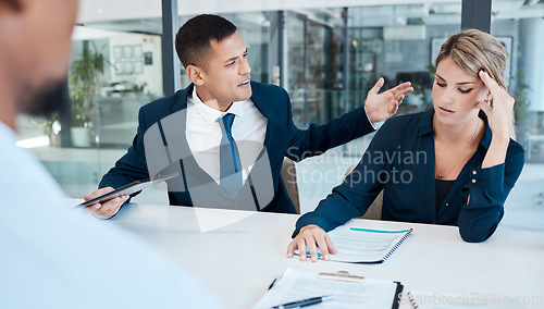 Image of Angry, fight and divorce lawyer at work bullying a person in a meeting due to a mistake and office politics in the company. Stress, conflict and anger worker frustrated with corporate businesswoman