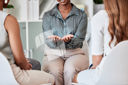 Image of Support group, therapy and help from business woman, counselor or therapist coach in counseling meeting. Palm of psychologist hands, safety and team trust circle workshop for open group communication