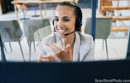 Image of Call center worker consulting on consultation online on computer, woman working in crm for telemarketing company and customer service support on internet. Happy, smile and startup consultant at work