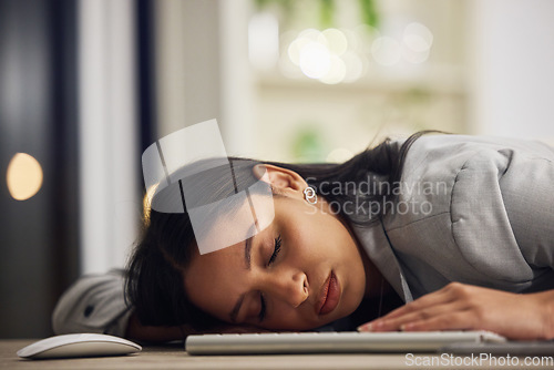 Image of Sleeping, desk and office employee with burnout from working late to fix a mistake on a deadline. Stress, dream and tired person with sleep problem from mental health fatigue at stressful job.