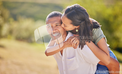 Image of Love, date and outdoor couple in park playing on holiday, vacation or healthy lifestyle with green trees, bokeh and summer sun. Happy, wellness black people piggyback ride together or nature hiking