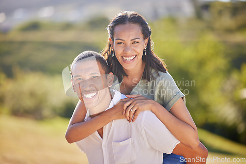 Image of Portrait, piggyback and happy couple in nature on a romantic date, vacation or walk in green garden. Love, care and smile of a husband and wife bonding in an outdoor park while on a summer holiday.