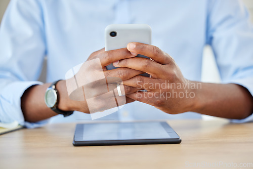 Image of Phone, communication and business man working and texting with 5g network, social media and chatting on messaging app on smartphone at desk. Closeup hands of professional worker checking email
