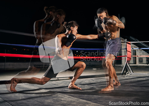 Image of Sport, boxing and fight with a boxer and coach training for health, fitness and exercise in a ring at the gym. Workout, sports and cardio with a coach and student fighting for health and cardio