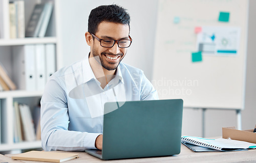 Image of Business man typing on laptop, research or working on marketing, accounting or data. Corporate person, on computer or reading, writing email or planning a finance project in the office with a smile
