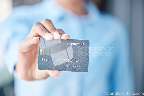 Image of Finance, savings and a credit card in hand, woman with financial freedom blurred in background. Banking, overdraft and a budget for retail or online shopping. Investment, payment and access to money.