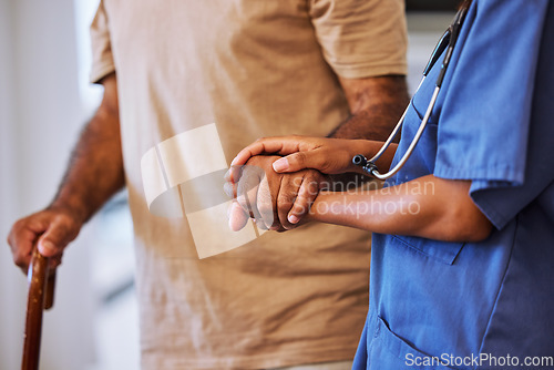 Image of Support, trust and help from caregiver or nurse walking with senior man or patient in retirement home with healthcare insurance. Hands of female medical worker and alzheimers male with hospice care