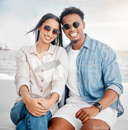 Image of Sunglasses, summer and couple portrait at the beach for holiday, vacation with casual fashion style. Gen z or millennial woman, man or people smile together with ocean, sea and clear sky mock up