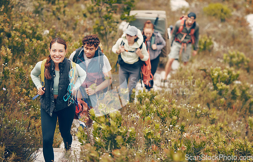 Image of Group of friends hike trail up mountain, to camp in nature landscape on extreme adventure holiday. Team of people explore earth together, on hiking trip to mountains or hill while on vacation.