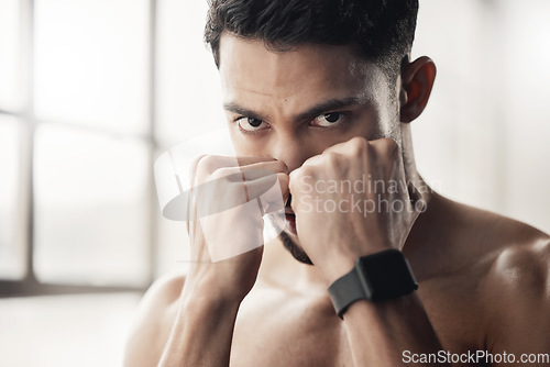 Image of Boxing man, fitness or motivation for health goal, power training or workout in wellness gym. Portrait of athlete, boxer hands or fist in sports room for energy exercise, combat fight or self defense