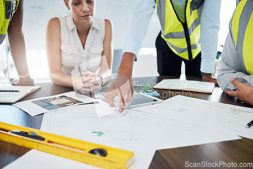 Image of Construction, blueprint and planning with architect in meeting for consulting, project management and vision. Design, engineering and construction site plans with team of designers or contractors