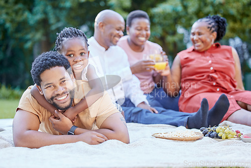 Image of Black family, picnic and father bonding with girl in nature park and public garden. Portrait of smile, happy or fun man with small child, grandparents and seniors in reunion for health food and drink