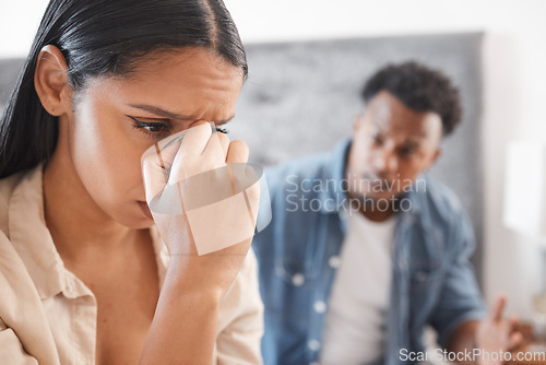 Image of Divorce, stress and couple fight on a bed, noise and conflict with toxic man and woman. Interracial relationship issue with young husband and wife in conflict, breakup and abuse bedroom problem