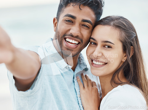 Image of Love, happy and smile for selfie couple enjoy quality time on romantic outdoor date or holiday vacation. Romance, photo memory or relationship portrait of Indian man and girl relax, freedom and peace