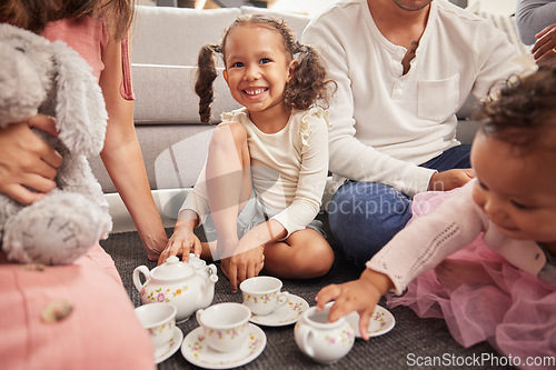 Image of Happy, kids and children at play date have tea party, fun and playing together on home living room floor. Development, youth and group of little girl friends imagine theyre a princess at royal party