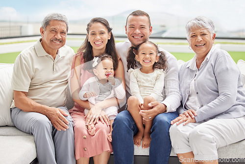 Image of Portrait of a family on vacation outdoors, happy and smiling while bonding with their grandmother and grandfather. Cheerful children having fun with their parents and grandparents on weekend