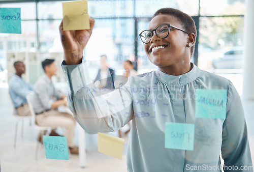 Image of Planning, writing and sticky notes with business woman in strategy, marketing or vision meeting in corporate company. Idea, post it, and creative black woman working on moodboard or brainstorming