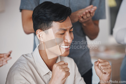 Image of Success, motivation and winning hand sign with business people victory celebration in an office together. Asian man closeup of happy expression, feeling like a winner after good feedback or proposal