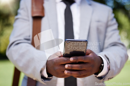 Image of African accountant businessman hands with phone on social media or reading news on corporate finance and success strategy. Black management employee of digital technology and network mobile company