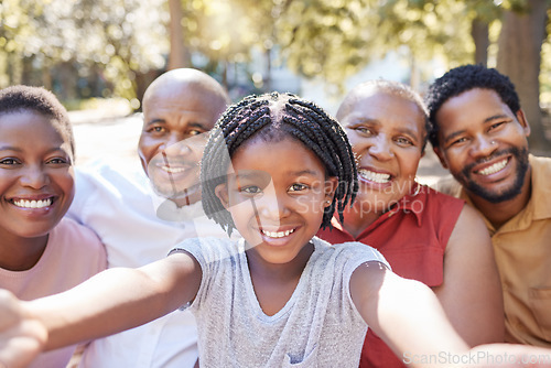 Image of Black family, selfie and smile of child taking a picture with her parents and grandparents outside at a park in nature. Portrait of a girl having fun, love and bonding with family feeling happy