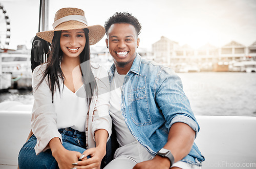 Image of Couple, love and yacht with a man and woman on a date on the sea or ocean with the city, harbor or promenade in the background. Dating, romance and affection with a diverse male and woman outdoor