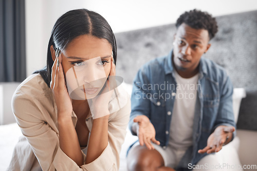 Image of Couple fight, marriage depression and divorce stress, anxiety from mental health and tired of conflict in house bedroom. Sad woman frustrated with headache during communication with man about problem