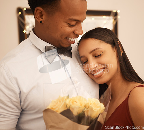 Image of Love, hug and flowers with couple on date for anniversary, valentines day or celebration together. Embrace, gift and happy with young man giving roses to girlfriend in a romantic relationship